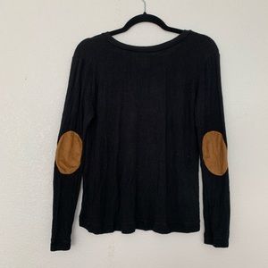 Black long sleeve top with professor elbow patch